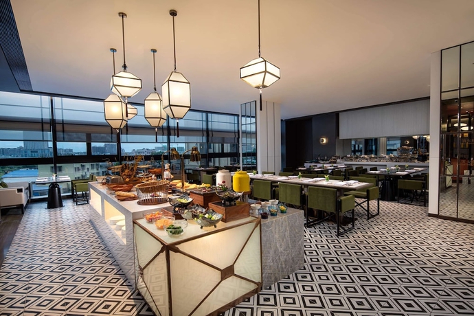 Imagen del bar/restaurante del Hotel Ramada Plaza By Wyndham Xiangtan Wanlou. Foto 5