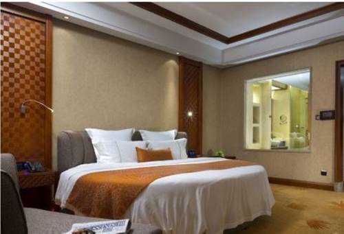Imagen de la habitación del Hotel Ramada Plaza By Wyndham Xishuangbanna South. Foto 1
