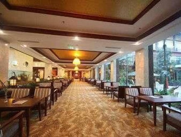 Imagen general del Hotel Ramada Plaza By Wyndham Xishuangbanna South. Foto 1