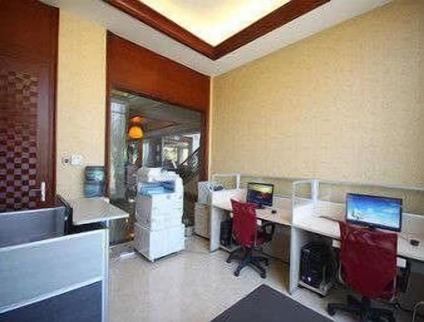 Imagen de los interiores del Hotel Ramada Plaza By Wyndham Xishuangbanna South. Foto 10