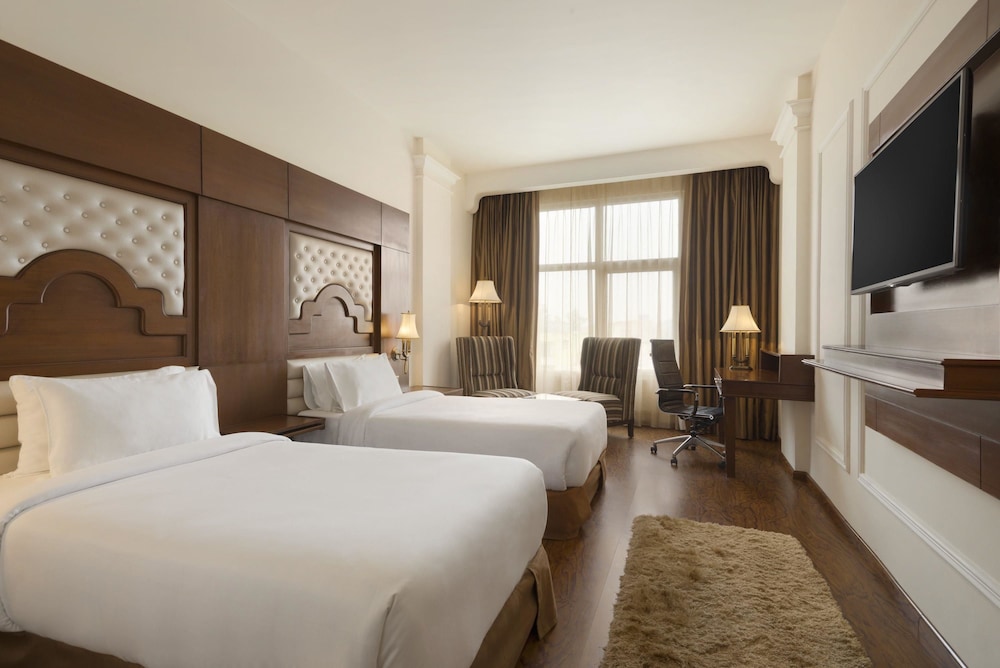 Imagen de la habitación del Hotel Ramada Plaza, Chandigarh, Zirakpur. Foto 16