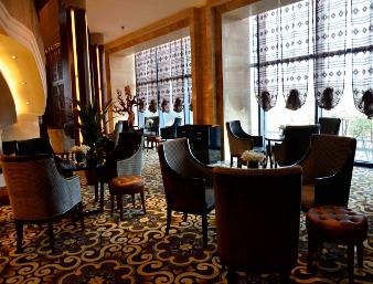 Imagen del bar/restaurante del Hotel Ramada Plaza ChongQing North. Foto 3