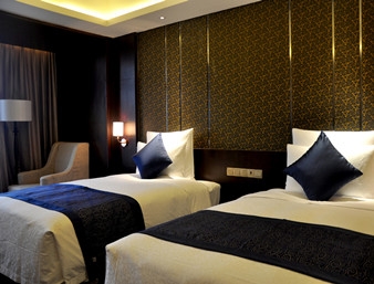 Imagen de la habitación del Hotel Ramada Plaza Chongqing Banan. Foto 5