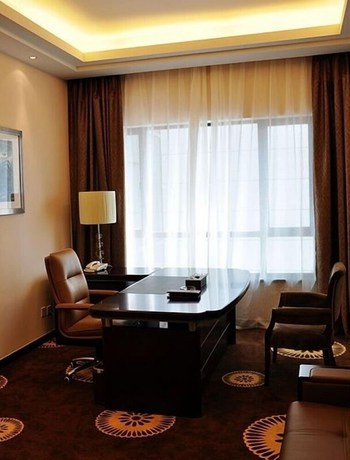 Imagen de la habitación del Hotel Ramada Plaza Hangzhou Xiaoshan. Foto 10