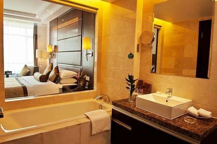 Imagen de la habitación del Hotel Ramada Plaza Hangzhou Xiaoshan. Foto 11