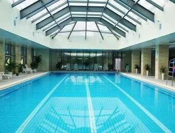 Imagen de la piscina del Hotel Ramada Plaza Hangzhou Xiaoshan. Foto 20