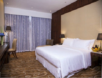 Imagen de la habitación del Hotel Ramada Plaza Huizhou East. Foto 4