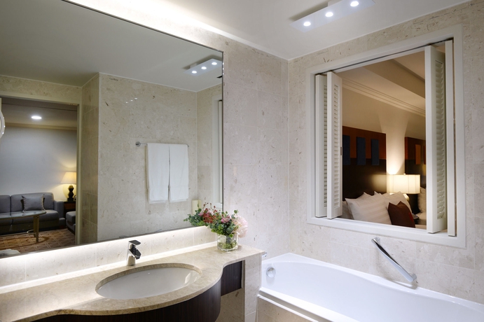 Imagen de la habitación del Hotel Ramada Plaza Jeju Ocean Front. Foto 11