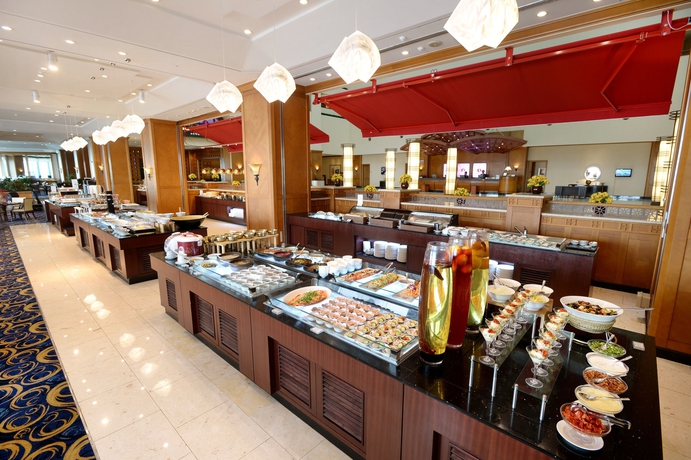 Imagen del bar/restaurante del Hotel Ramada Plaza Jeju Ocean Front. Foto 4