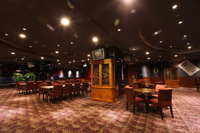 Imagen del bar/restaurante del Hotel Ramada Plaza Jeju Ocean Front. Foto 8