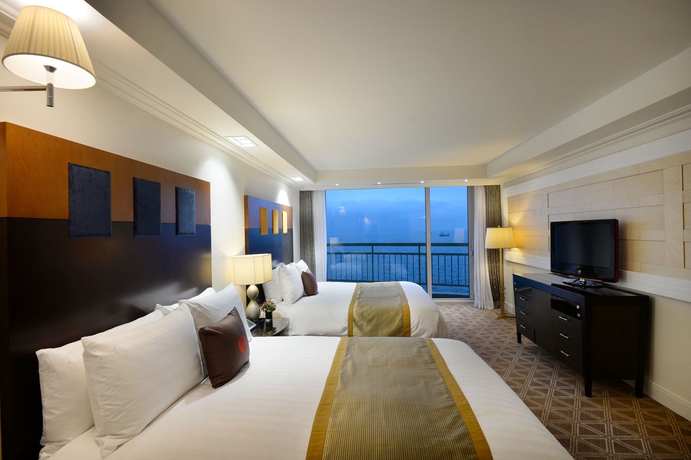 Imagen de la habitación del Hotel Ramada Plaza Jeju Ocean Front. Foto 12