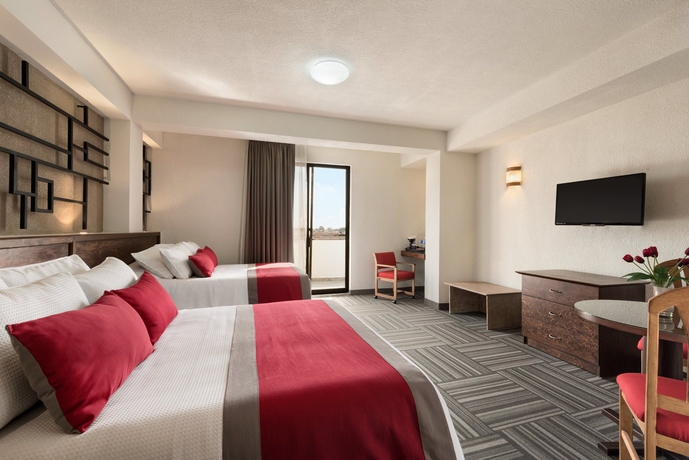 Imagen de la habitación del Hotel Ramada Plaza Leon. Foto 5