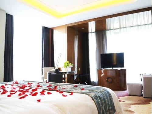 Imagen de la habitación del Hotel Ramada Plaza Liuzhou Liudong. Foto 5