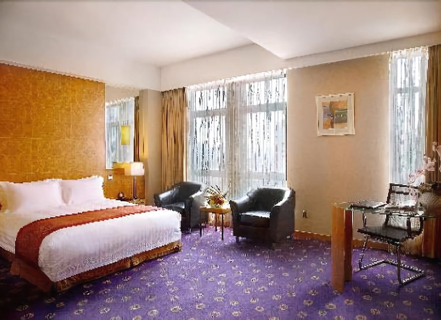 Imagen de la habitación del Hotel Ramada Plaza Pu Dong South Shanghai. Foto 8