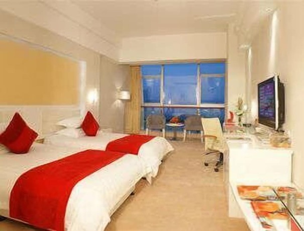 Imagen de la habitación del Hotel Ramada Plaza Riverside Hangzhou. Foto 5