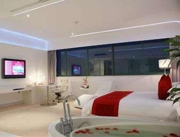 Imagen de la habitación del Hotel Ramada Plaza Riverside Hangzhou. Foto 9