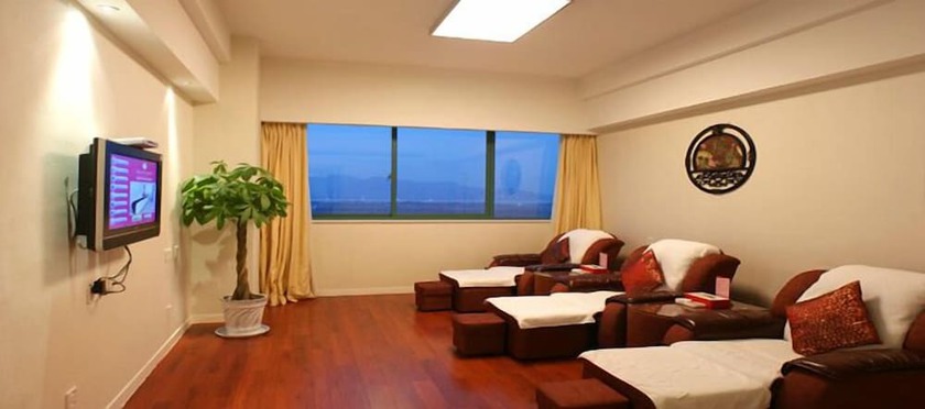 Imagen de los interiores del Hotel Ramada Plaza Riverside Hangzhou. Foto 11