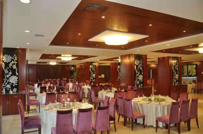 Imagen del bar/restaurante del Hotel Ramada Plaza Riverside Hangzhou. Foto 2