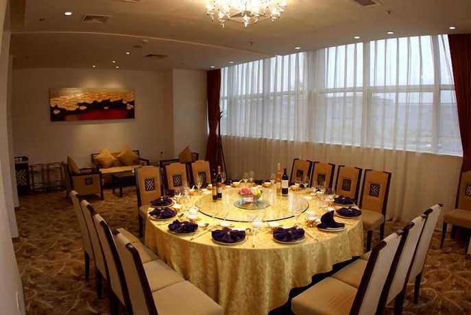 Imagen de los interiores del Hotel Ramada Plaza Riverside Hangzhou. Foto 13