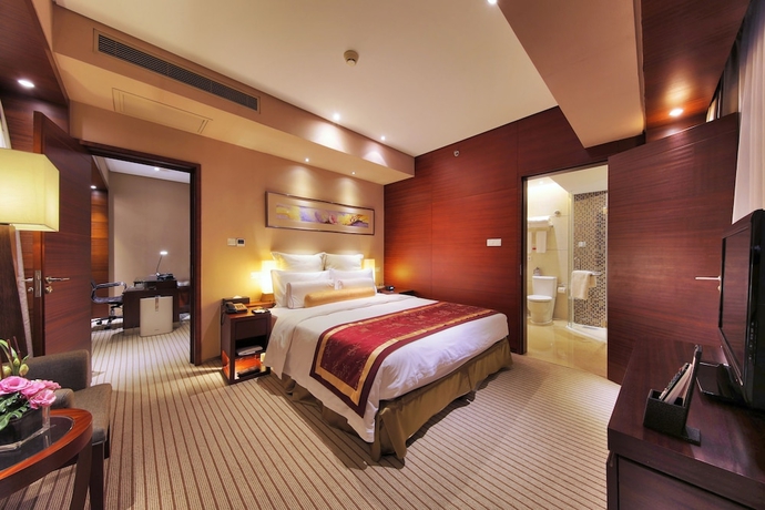 Imagen de la habitación del Hotel Ramada Plaza Shanghai Caohejing. Foto 4