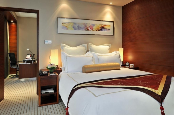 Imagen de la habitación del Hotel Ramada Plaza Shanghai Caohejing. Foto 5