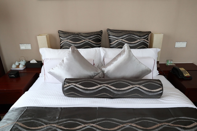 Imagen de la habitación del Hotel Ramada Plaza Shanghai Caohejing. Foto 6