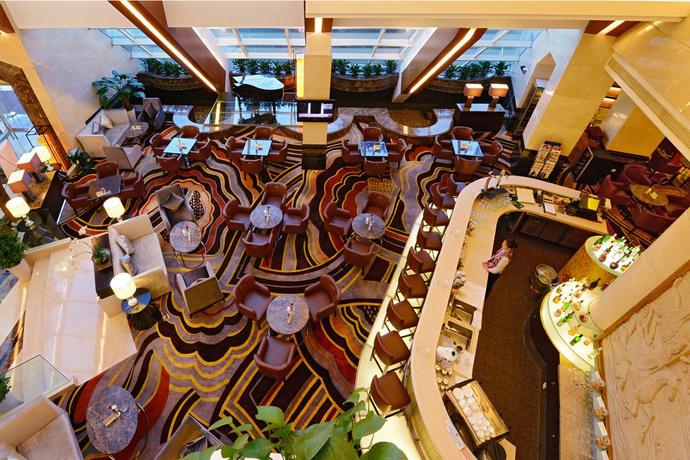 Imagen de los interiores del Hotel Ramada Plaza Shanghai Pudong Airport. Foto 11