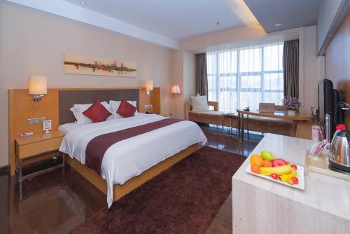 Imagen de la habitación del Hotel Ramada Plaza Shenzhen North. Foto 5