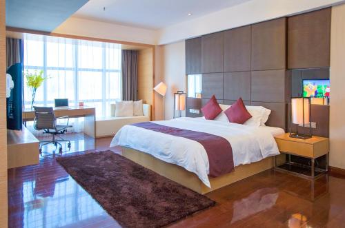 Imagen de la habitación del Hotel Ramada Plaza Shenzhen North. Foto 7