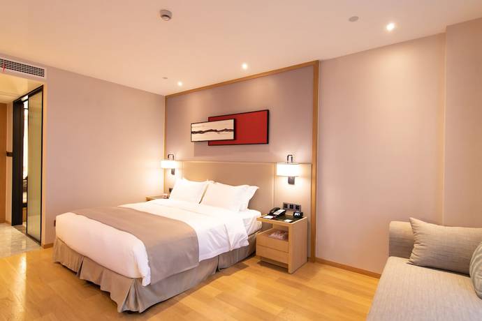 Imagen de la habitación del Hotel Ramada Plaza Wyndham Wenzhou Cangnan. Foto 3