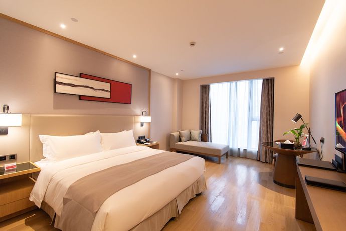 Imagen de la habitación del Hotel Ramada Plaza Wyndham Wenzhou Cangnan. Foto 4