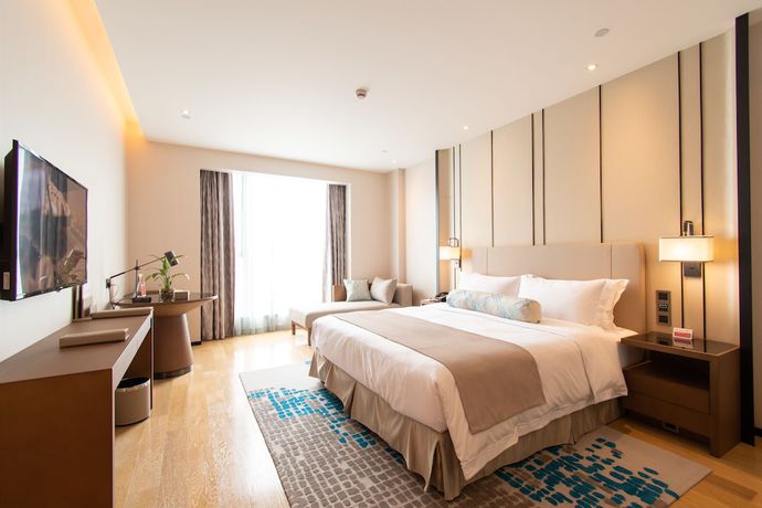 Imagen de la habitación del Hotel Ramada Plaza Wyndham Wenzhou Cangnan. Foto 7