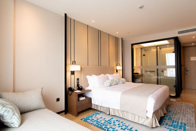 Imagen de la habitación del Hotel Ramada Plaza Wyndham Wenzhou Cangnan. Foto 9