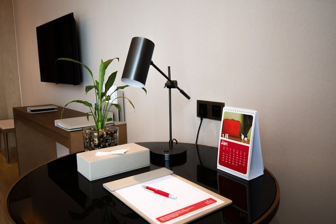 Imagen de la habitación del Hotel Ramada Plaza Wyndham Wenzhou Cangnan. Foto 10