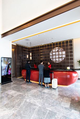 Imagen de los interiores del Hotel Ramada Plaza Wyndham Wenzhou Cangnan. Foto 20