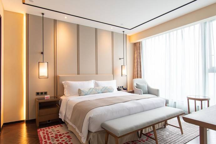 Imagen de la habitación del Hotel Ramada Plaza Wyndham Wenzhou Cangnan. Foto 18