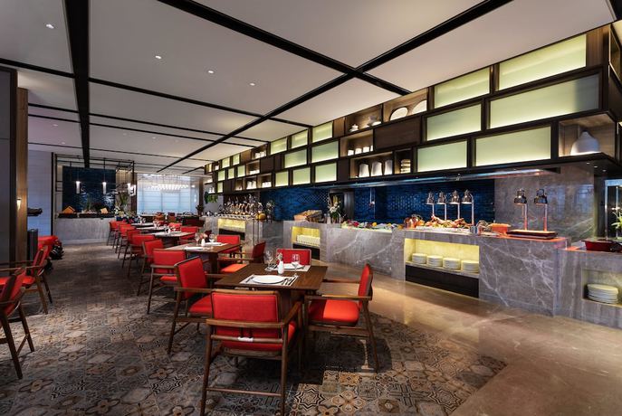 Imagen del bar/restaurante del Hotel Ramada Plaza Wyndham Xiangyang Xiangzhou. Foto 6