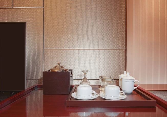 Imagen de la habitación del Hotel Ramada Plaza Yiwu. Foto 3