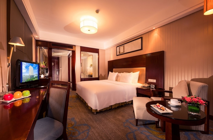 Imagen de la habitación del Hotel Ramada Plaza Yiwu. Foto 4