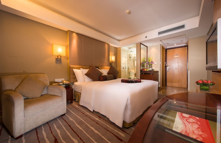 Imagen de la habitación del Hotel Ramada Plaza Yiwu. Foto 6