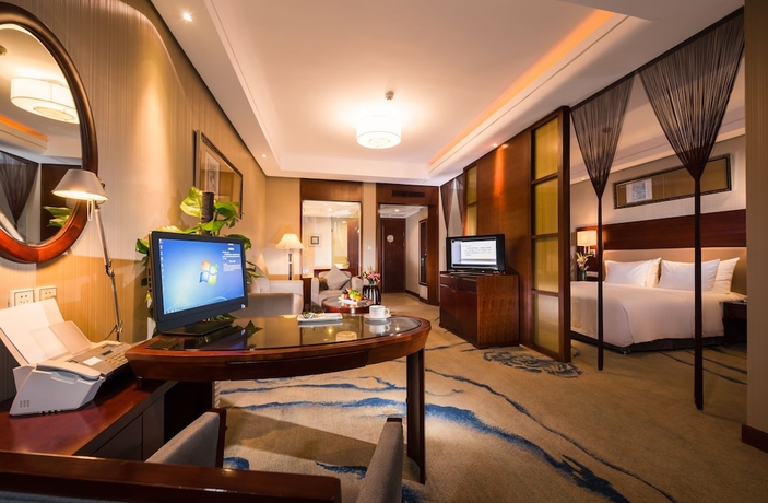 Imagen de la habitación del Hotel Ramada Plaza Yiwu. Foto 9