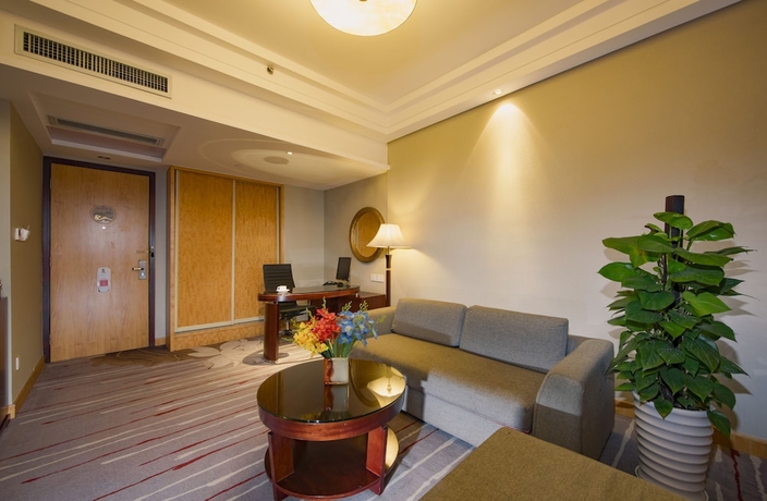 Imagen de la habitación del Hotel Ramada Plaza Yiwu. Foto 11