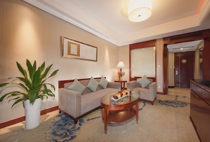 Imagen de la habitación del Hotel Ramada Plaza Yiwu. Foto 12