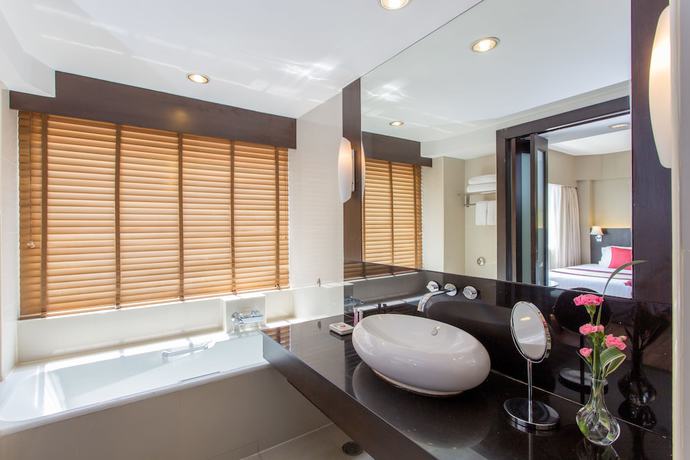 Imagen de la habitación del Hotel Ramada Plaza by Wyndham Bangkok Menam Riverside. Foto 4