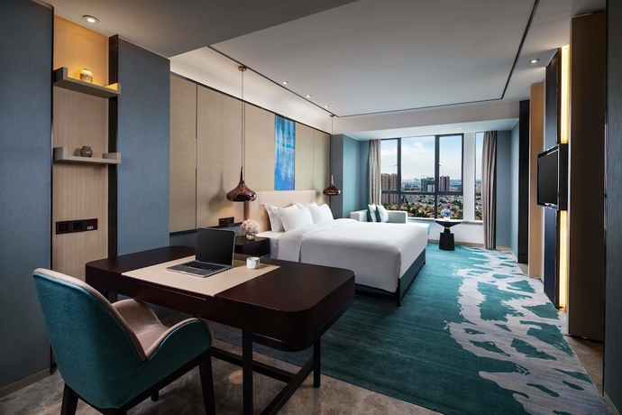 Imagen de la habitación del Hotel Ramada Plaza by Wyndham Changsha Xingsha. Foto 4