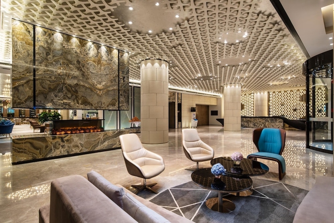 Imagen de los interiores del Hotel Ramada Plaza by Wyndham Changsha Xingsha. Foto 10
