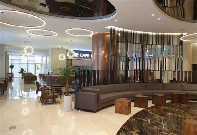 Imagen del bar/restaurante del Hotel Ramada Plaza by Wyndham Dolsan Yeosu. Foto 4
