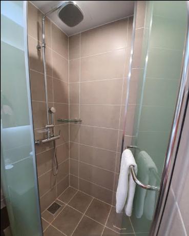 Imagen de la habitación del Hotel Ramada Plaza by Wyndham Dolsan Yeosu. Foto 9