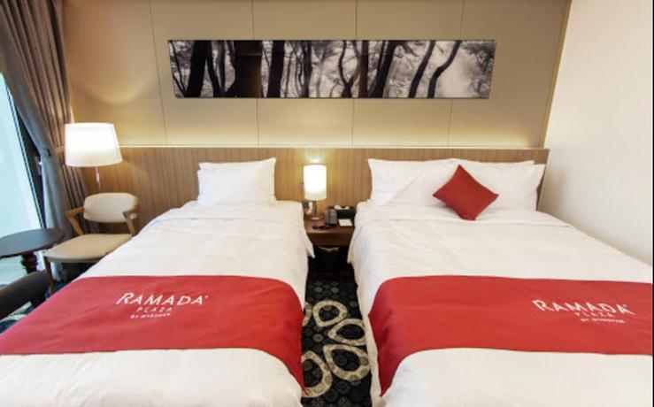 Imagen de la habitación del Hotel Ramada Plaza by Wyndham Dolsan Yeosu. Foto 11
