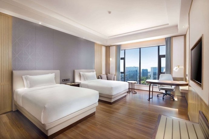 Imagen de la habitación del Hotel Ramada Plaza by Wyndham Dongguan Songshan Lake. Foto 3
